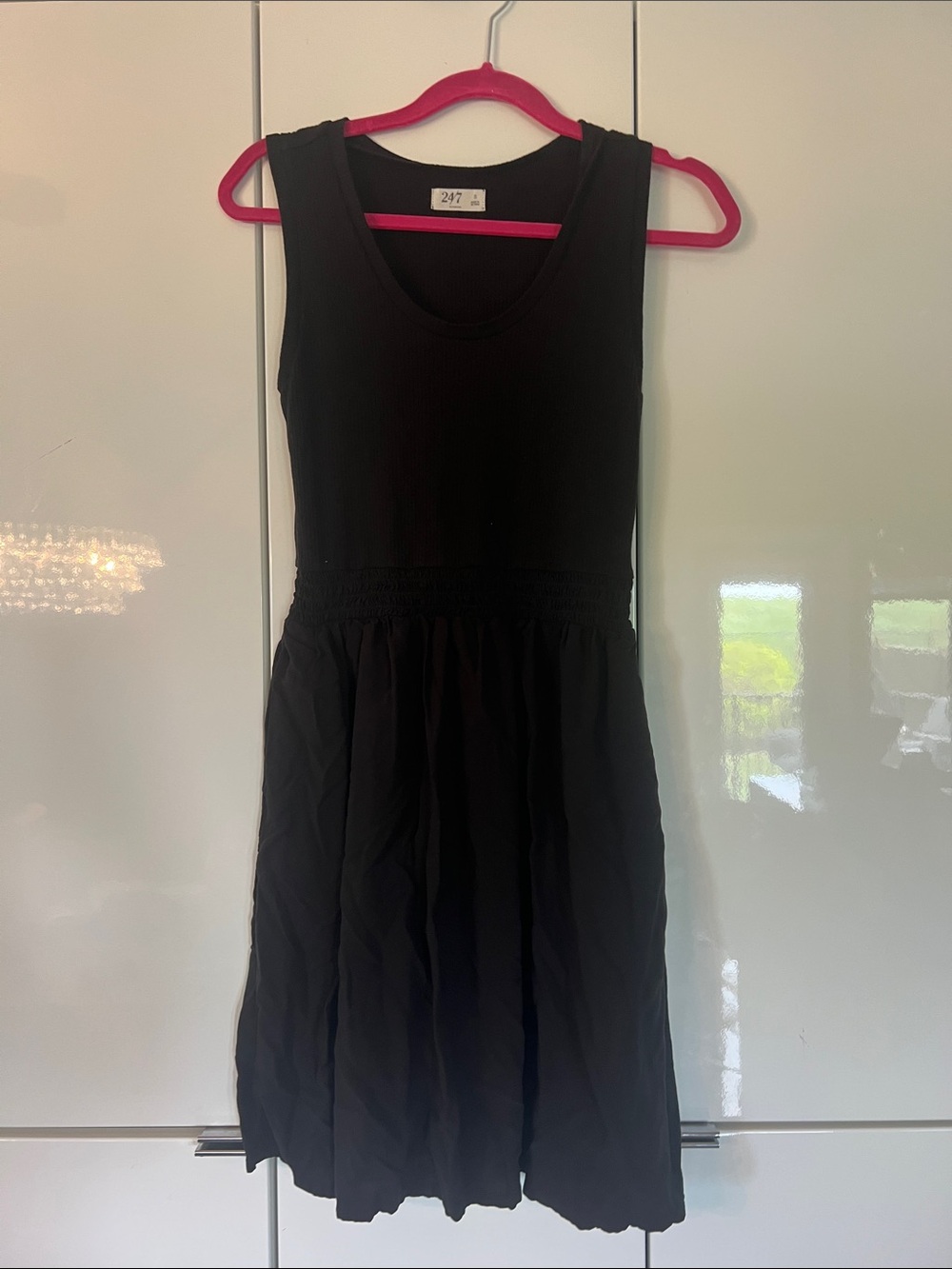 Sleeveless Black Mini Dress with Smocked Waist